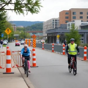 Chattanooga Riverwalk under construction with cyclists sharing a lane with vehicles.