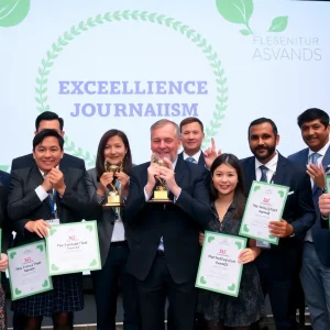 Journalists celebrating their awards at the Green Eyeshade event